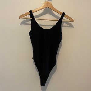 Black tank bodysuit never worn